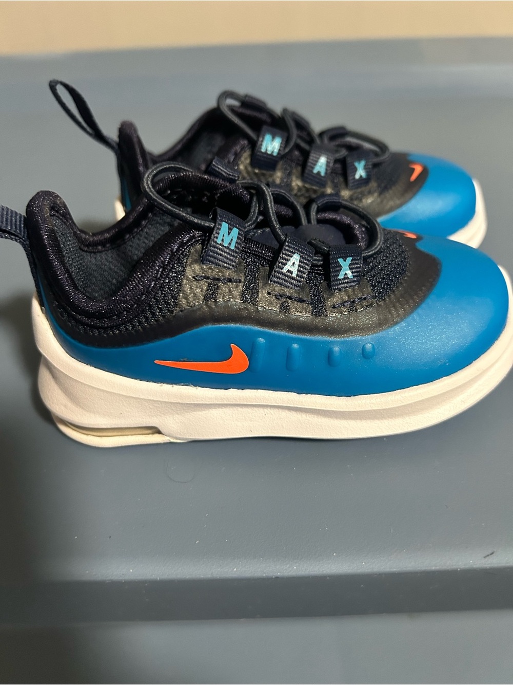 Nike AirMax Axis  Blue, Black and White with Orange Swoosh